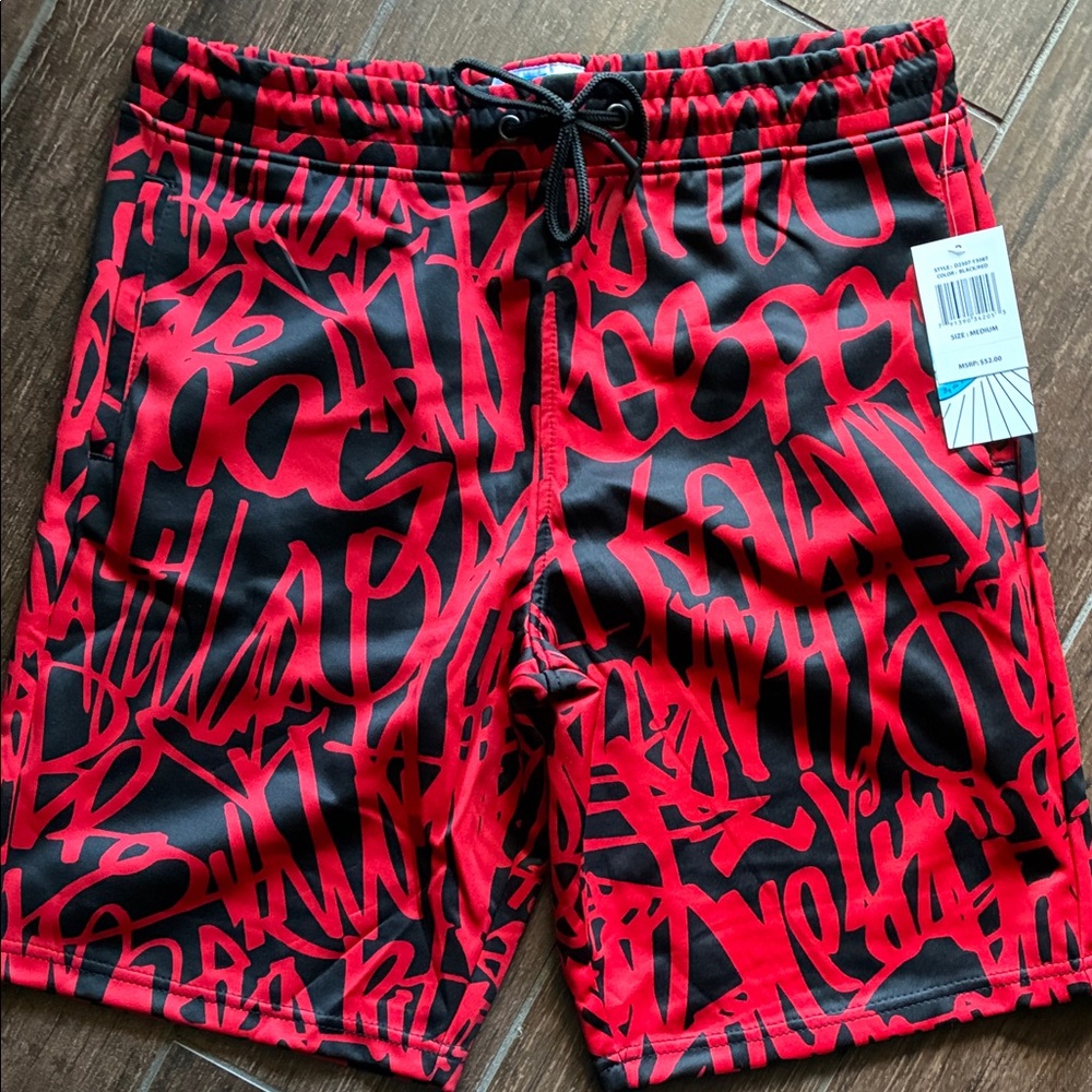 Red and Black Graphic Board Shorts. Men’s medium